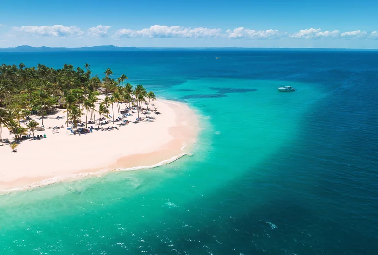 Snorkelling and dinghy off a Caribbean beach