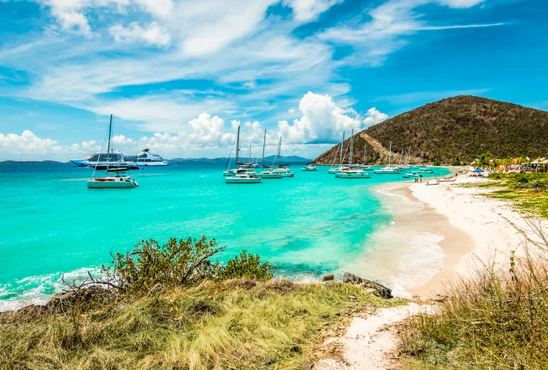 Yachts anchored off White Bay beach on Jost Van Dyke in the BVI